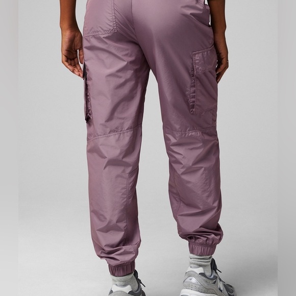 Fabletics Parachute Pant Size S
Lightweight Cargo Jogger
Windbreaker Plum Shine - Picture 2 of 11